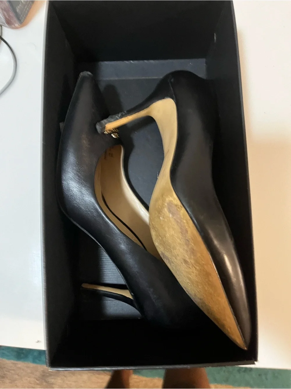 Coach Black Leather Pointed-Toe Pump with Gold Logo Accent. The purse is nwot